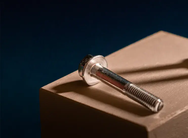 Fastener treated with ZETAPLUS 450  ammonia free zinc brightener system