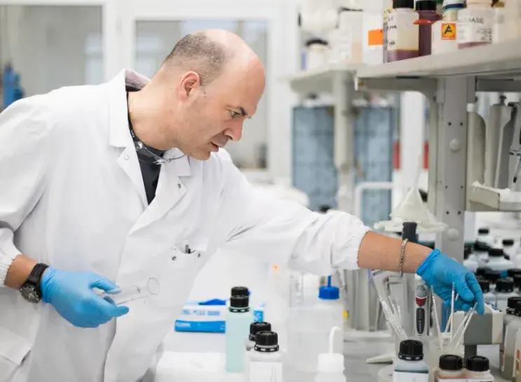 MacDermid Enthone employee sorting lab equipment
