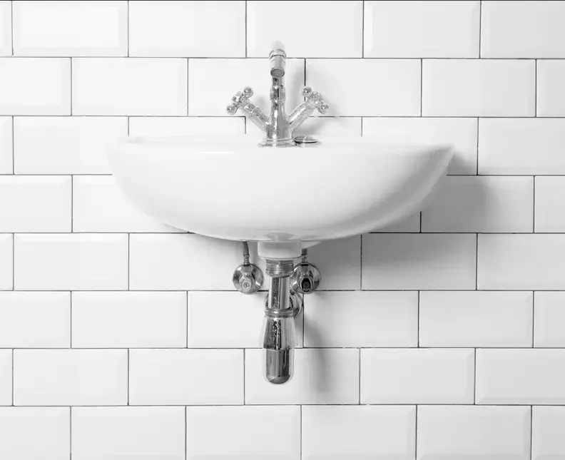 vintage sink with visible plumming