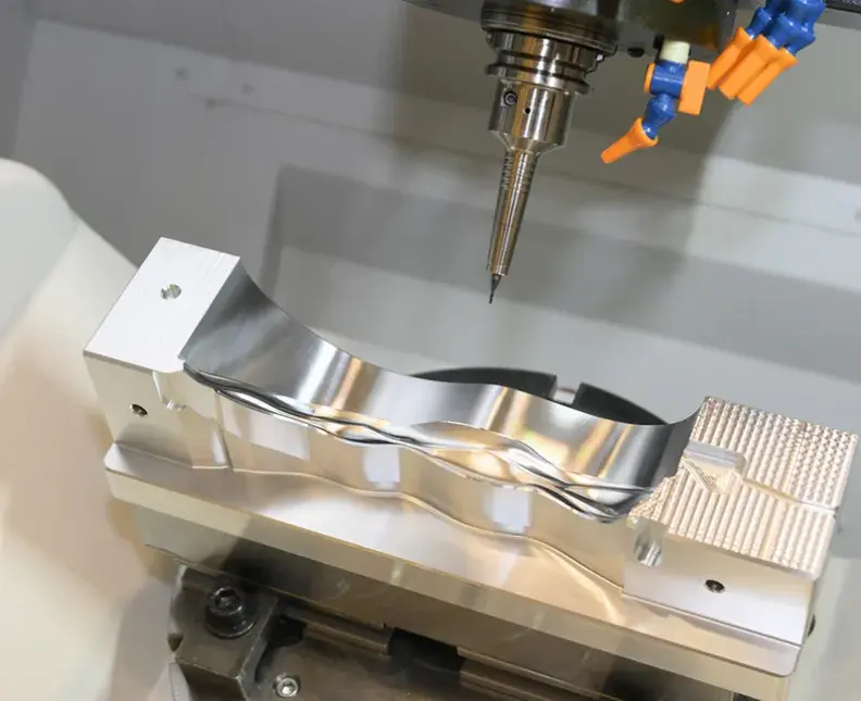 milling machine cutting the automotive mold parts