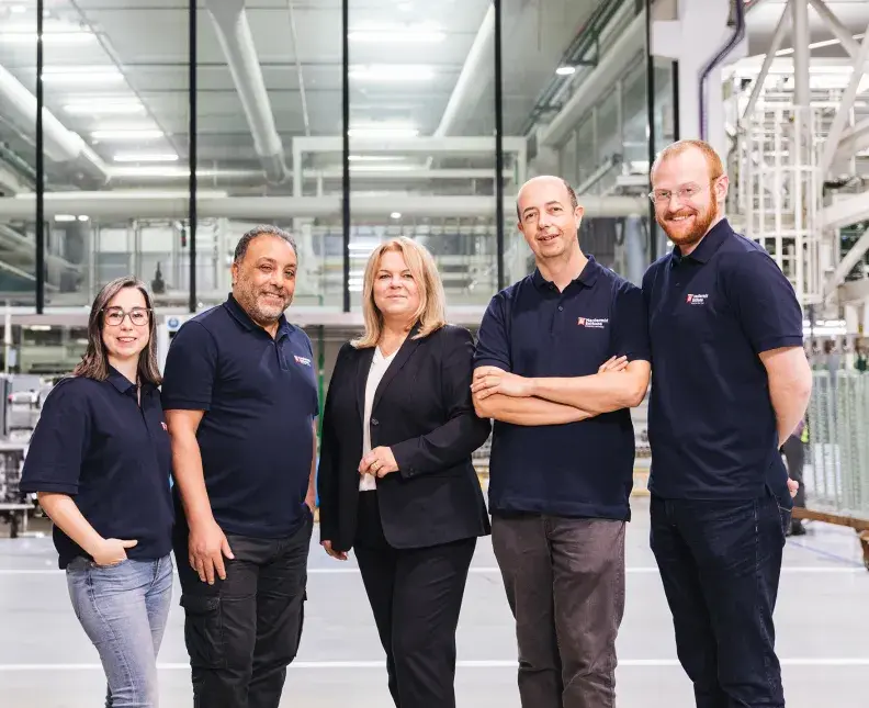 5 MacDermid Enthone employees in a customer facility