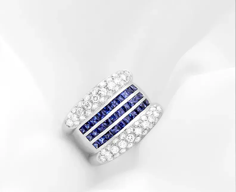 Platinum ring with blue and clear crystals